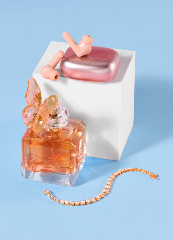 Perfume, headphones, and bracelet