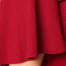 "As Is" DG2 by
Diane Gilman Knit Plisse Puff Sleeve V-neck Top