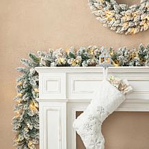 Glitzhome 2pk 6' Flocked Christmas Garland with Warm White LED Lights