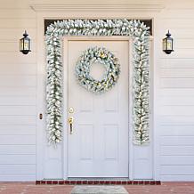 Glitzhome 2pk 6' Flocked Christmas Garland with Warm White LED Lights