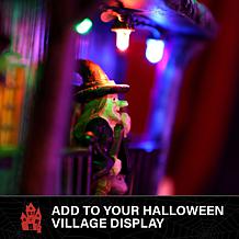 Haunted Hill Farm 1-Ft. Animated LED Haunted House with Flying Witc...