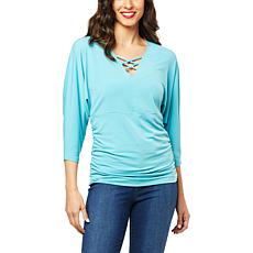 IMAN
Global Chic Criss-Cross Neckline Top
