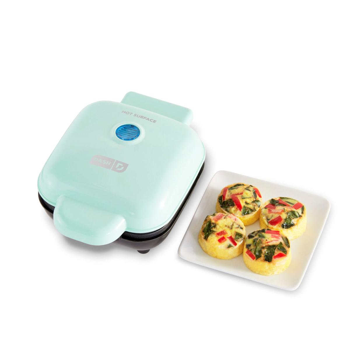 https://i03.hsncdn.com/is/image/HomeShoppingNetwork/rocs1200/dash-egg-bite-maker-with-recipes-d-2023041709580117~838802_alt3.jpg