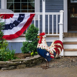 Red, white, and blue chicken sculpture
